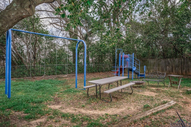 community play area featuring fence