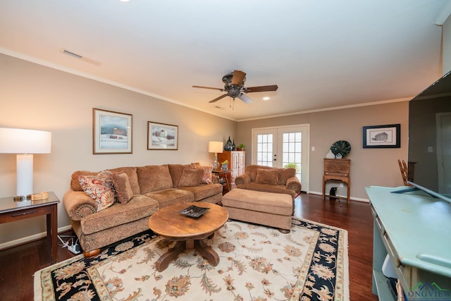 living room featuring french doors, dark hardwood / wood-style floors, ceiling fan, and ornamental molding