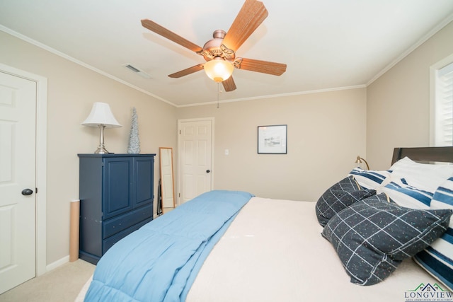 bedroom featuring ceiling fan, light colored carpet, and ornamental molding