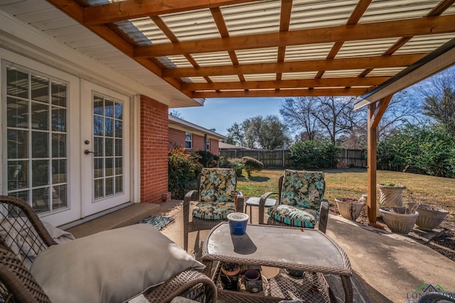 view of patio / terrace featuring french doors and a pergola