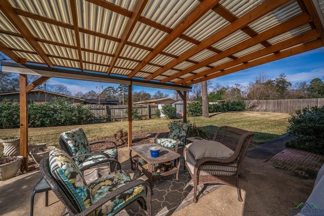 view of patio featuring a storage unit