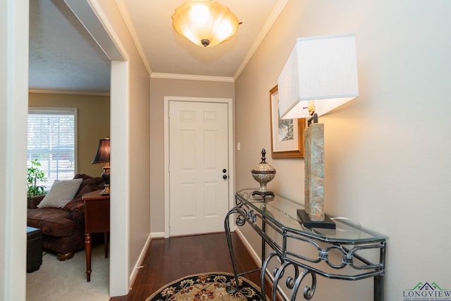 entrance foyer with dark wood-type flooring and ornamental molding