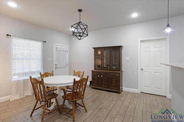 dining space featuring recessed lighting, baseboards, and light wood-type flooring