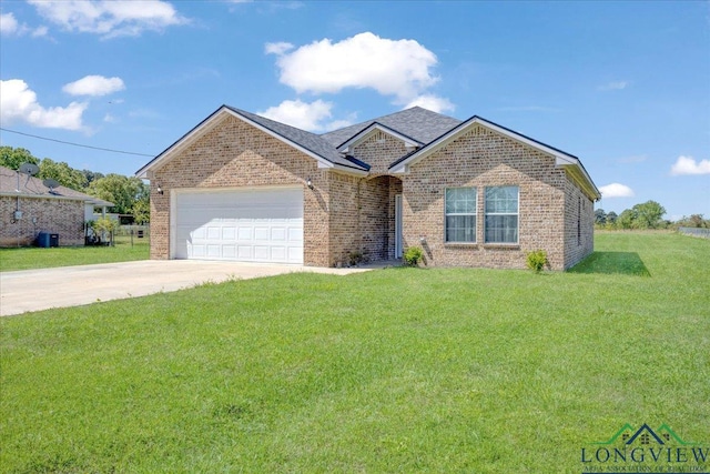 ranch-style home featuring concrete driveway, brick siding, a front yard, and a garage