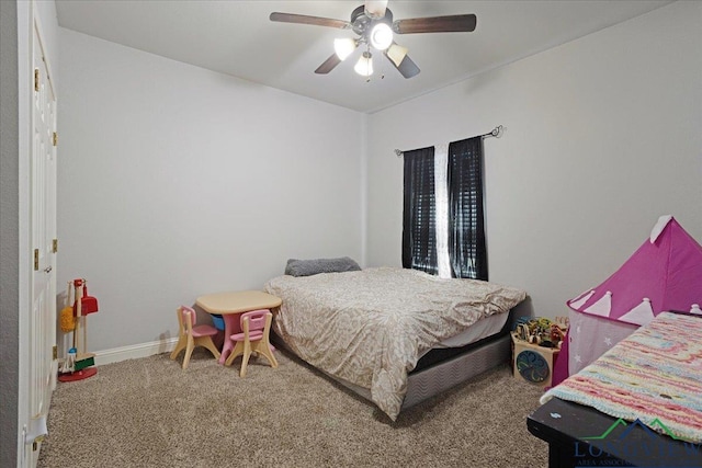 bedroom with baseboards, carpet flooring, and ceiling fan