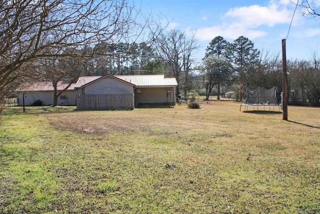 view of yard with a trampoline