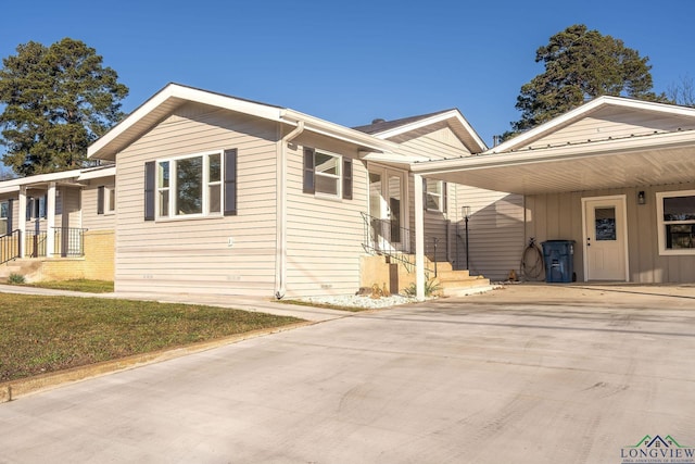 view of front of house featuring a front yard and a carport