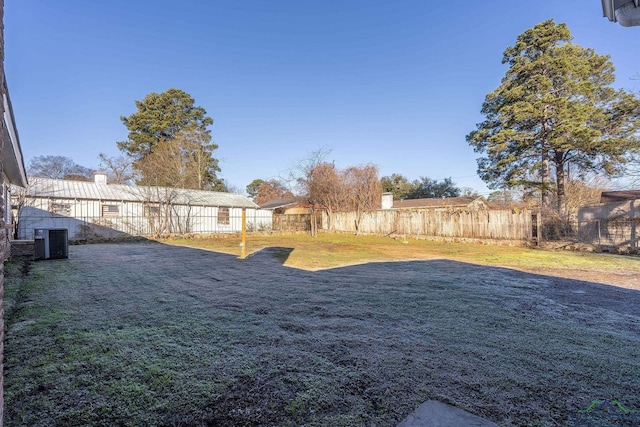 view of yard featuring central AC