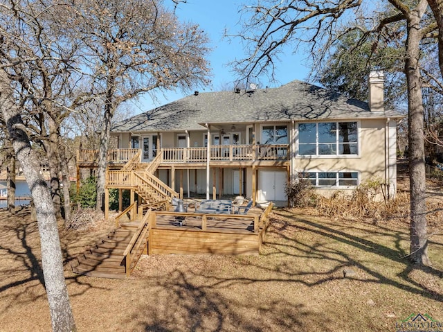 rear view of property featuring an outdoor hangout area and a deck