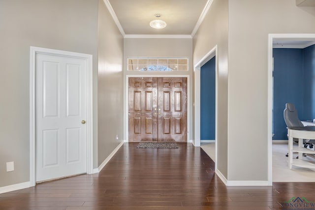 foyer featuring hardwood / wood-style floors and crown molding