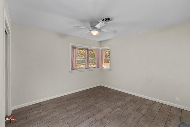 spare room featuring ceiling fan