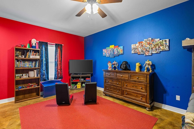 interior space with ceiling fan and carpet flooring