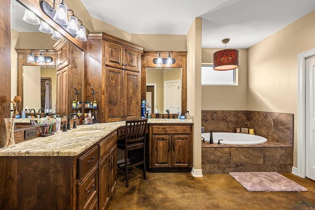 bathroom with a relaxing tiled tub and vanity