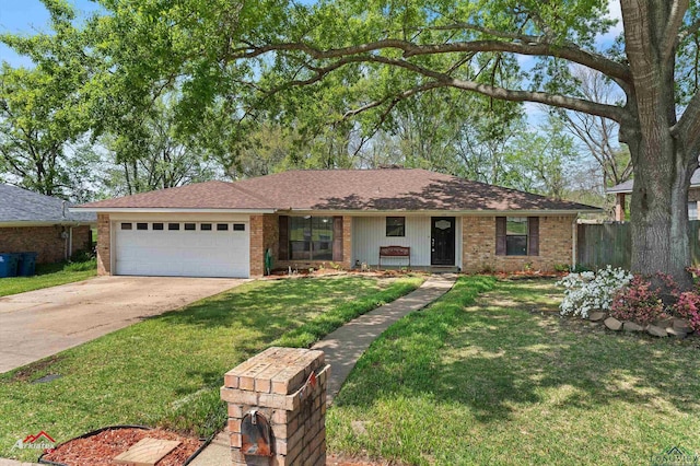 ranch-style home featuring a front yard, brick siding, concrete driveway, and an attached garage
