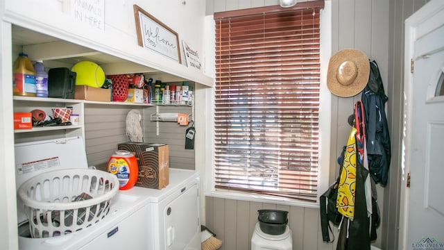 laundry area with washing machine and clothes dryer