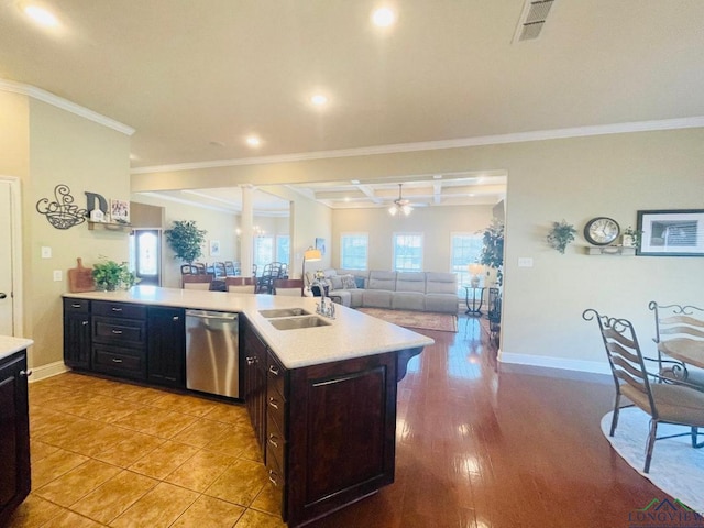1928 Eastwood Dr, Henderson, TX 75652 - kitchen with dishwasher, light countertops, recessed lighting, open floor plan, and coffered ceiling