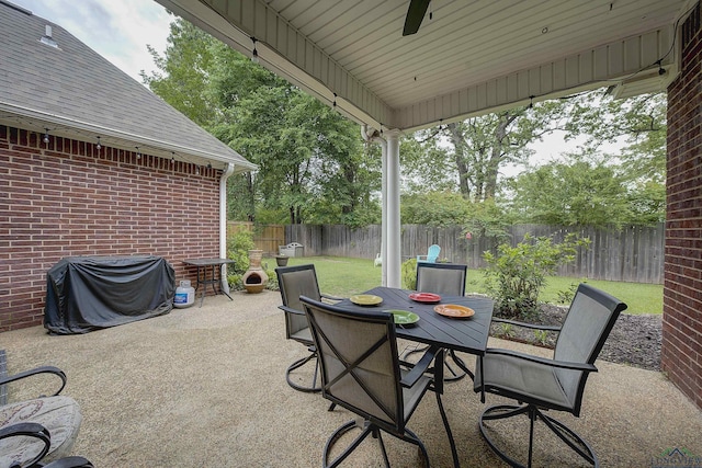 36 Briarwood Cir, Texarkana, TX 75503 - view of patio featuring outdoor dining space, a ceiling fan, and a grill