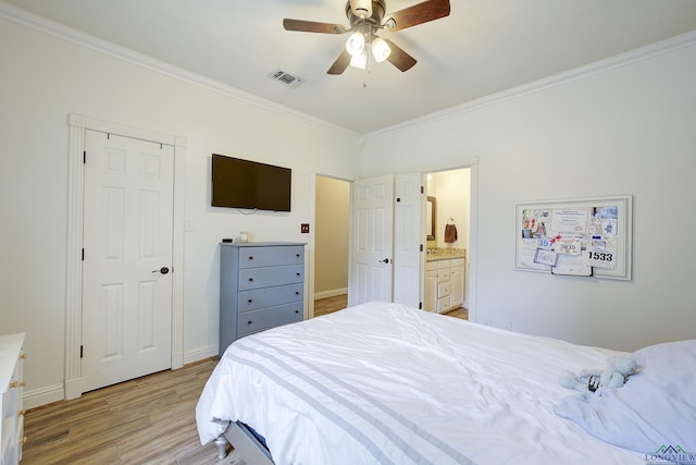 36 Briarwood Cir, Texarkana, TX 75503 - bedroom with ornamental molding, light wood-style floors, baseboards, a ceiling fan, and connected bathroom