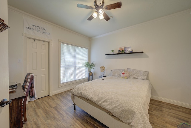 36 Briarwood Cir, Texarkana, TX 75503 - bedroom featuring ornamental molding, wood finished floors, baseboards, and ceiling fan