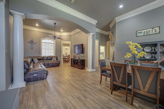 36 Briarwood Cir, Texarkana, TX 75503 - living area featuring decorative columns, crown molding, a ceiling fan, arched walkways, and wood finished floors