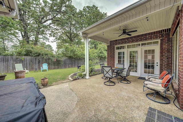 36 Briarwood Cir, Texarkana, TX 75503 - view of patio with ceiling fan, outdoor dining space, and french doors
