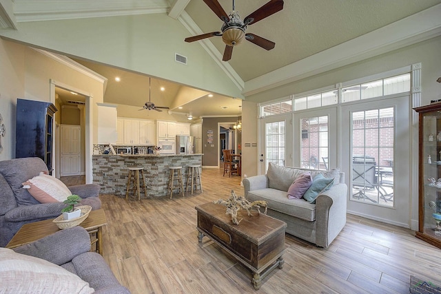 36 Briarwood Cir, Texarkana, TX 75503 - living room with a ceiling fan, high vaulted ceiling, light wood-style flooring, beamed ceiling, and ornamental molding