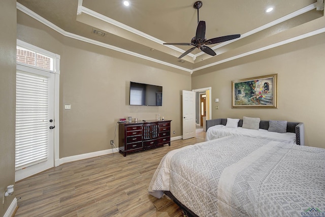36 Briarwood Cir, Texarkana, TX 75503 - bedroom with a tray ceiling, ornamental molding, wood finished floors, baseboards, and recessed lighting