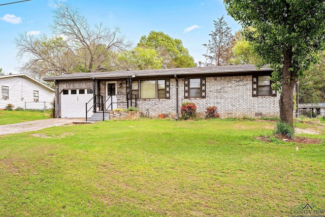 ranch-style house with a garage and a front yard