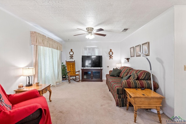 living room with ceiling fan and light colored carpet