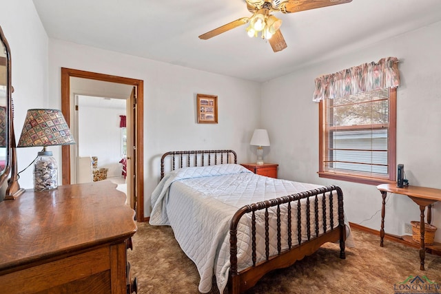 bedroom featuring ceiling fan and carpet