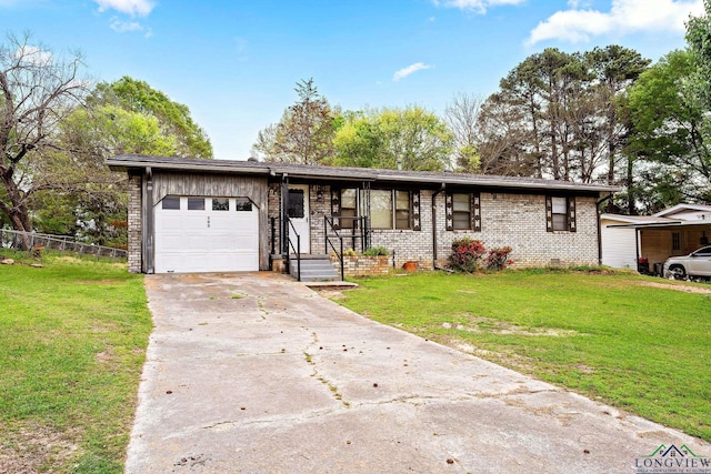 ranch-style home with a front yard and a garage