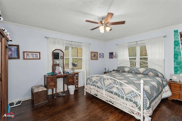 bedroom featuring hardwood / wood-style flooring, crown molding, and a textured ceiling