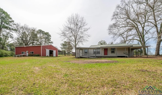 exterior space with an outdoor structure and a garage