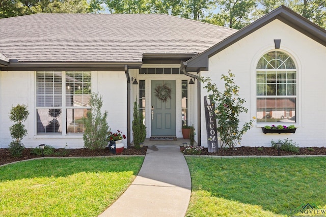 908 Victoria Dr, Longview, TX 75604 - entrance to property with a yard and a shingled roof