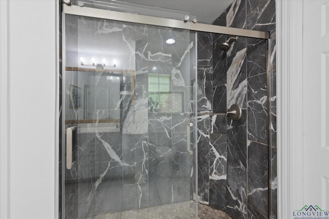 908 Victoria Dr, Longview, TX 75604 - full bathroom with a marble finish shower