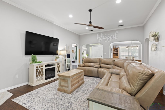 908 Victoria Dr, Longview, TX 75604 - living room featuring visible vents, crown molding, ceiling fan, recessed lighting, and arched walkways