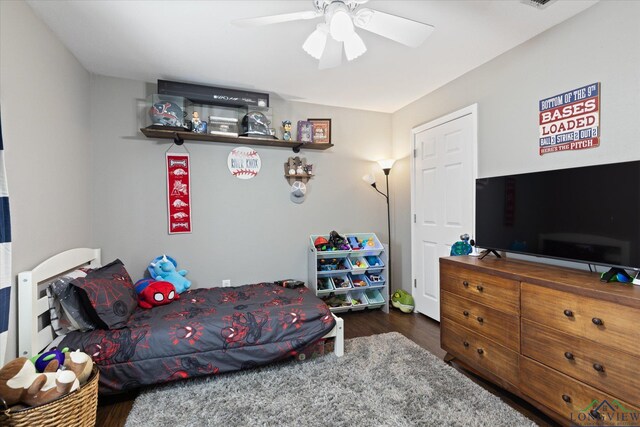 908 Victoria Dr, Longview, TX 75604 - bedroom featuring ceiling fan and wood finished floors
