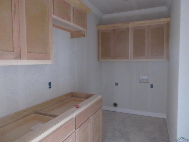 laundry room featuring hookup for an electric dryer, ornamental molding, cabinets, and washer hookup