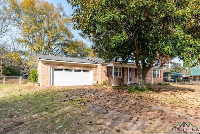 ranch-style home with a garage