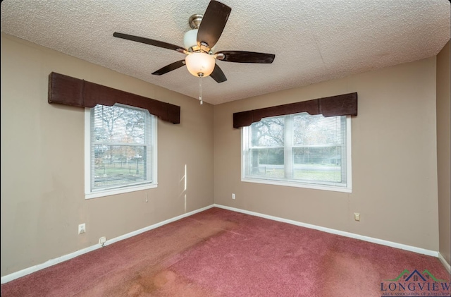 empty room with carpet, a textured ceiling, and ceiling fan