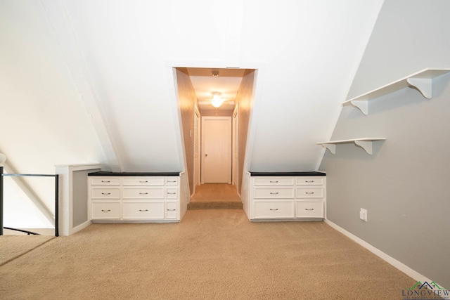 unfurnished bedroom with light colored carpet