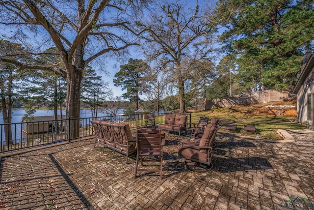 view of patio featuring a water view