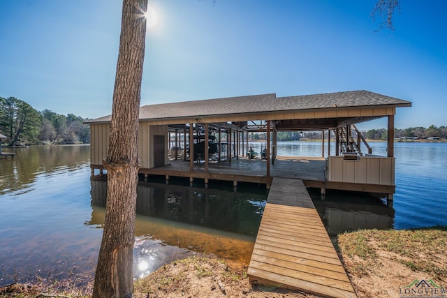 dock area featuring a water view