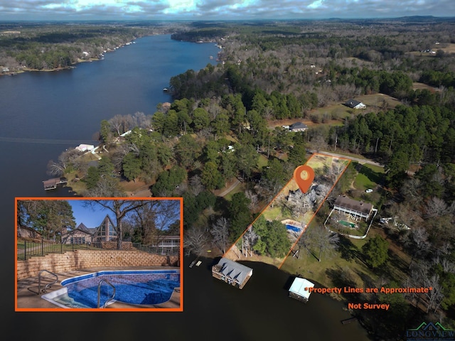 birds eye view of property featuring a water view