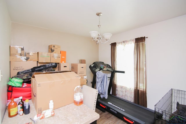206 E Shofner Dr, Longview, TX 75604 - workout room featuring a chandelier and wood finished floors