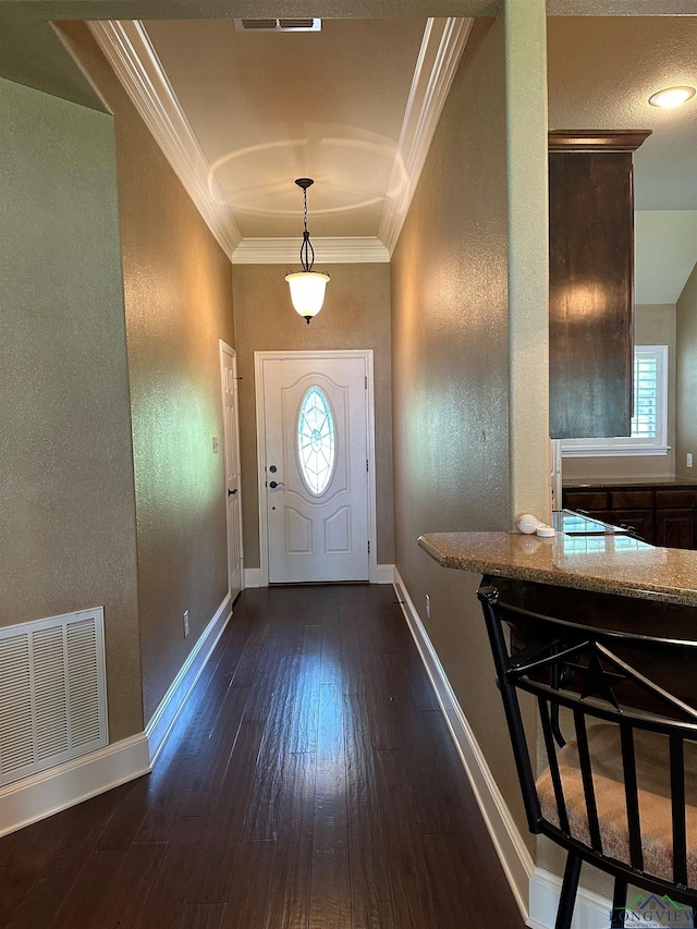 23196 Jeb Cir, Frankston, TX 75763 - foyer with crown molding, baseboards, a textured wall, and dark wood finished floors