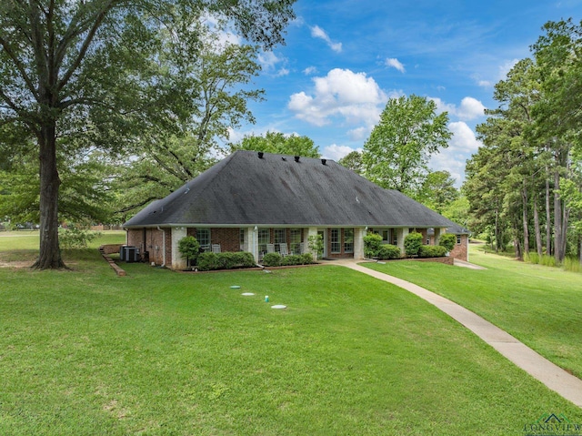 23196 Jeb Cir, Frankston, TX 75763 - view of front of home with a front lawn, brick siding, and french doors