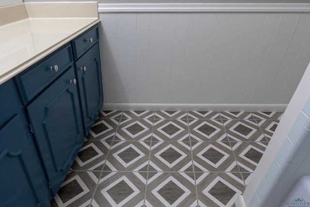 bathroom with vanity and tile patterned floors