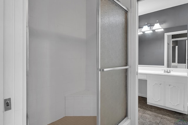bathroom with vanity and a stall shower