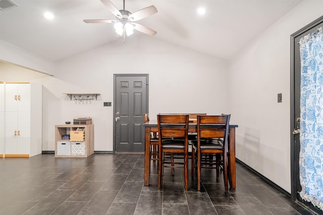 dining space featuring ceiling fan and lofted ceiling